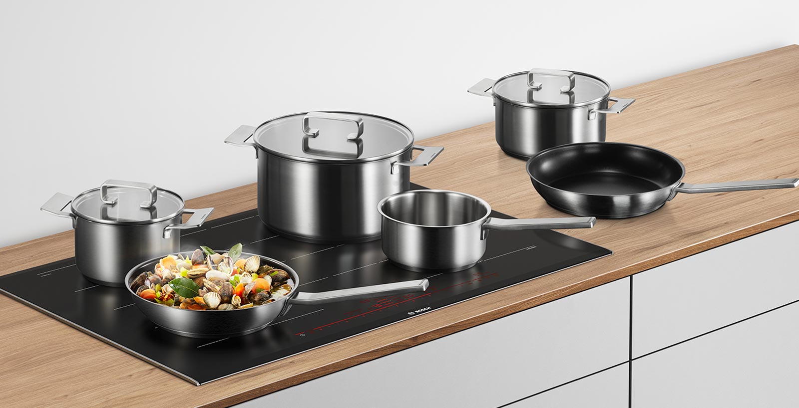 як включити індукційну плиту бош